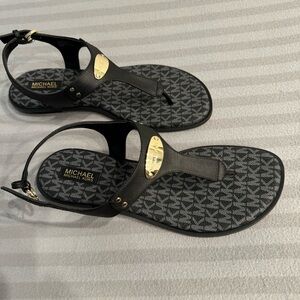 Brand New Michael Kors Black and Gold Sandals